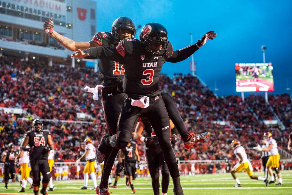 Chris Detrick  |  The Salt Lake Tribune
Utah Utes quarterback Troy Williams (3) and Utah Utes wide receiver Tim Patrick (12) celebrate after Williams' touchdown during the first half of the game at Rice-Eccles Stadium Friday September 23, 2016.