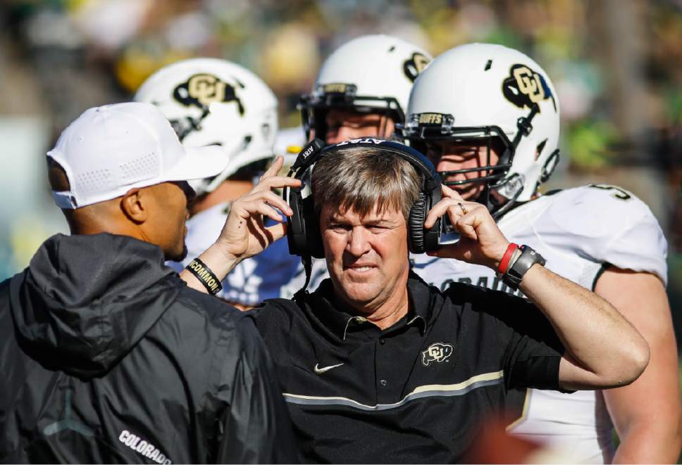 Colorado head coach Mike MacIntyre works the sidelines against Oregon in an NCAA college football game Saturday, Sept. 24, 2016 in Eugene, Ore. (AP Photo/Thomas Boyd)