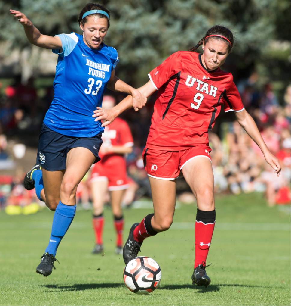 Rick Egan  |  The Salt Lake Tribune

Ashley Hatch (33) BYU, goes for the ball along with Aleea Gwerder (9) Utah,  in soccer action, BYU vs. Utah, at the Ute soccer field, Monday, September 5, 2016.