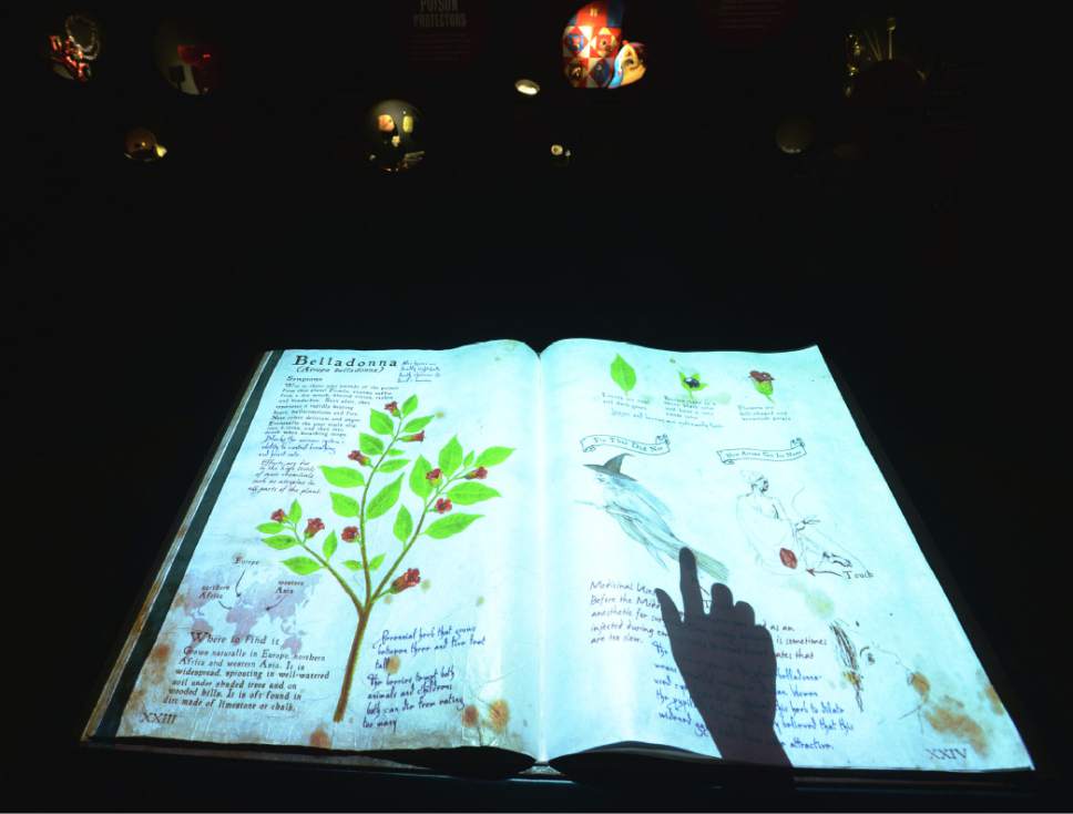 Steve Griffin / The Salt Lake Tribune

A giant interactive touch book is  part of the Natural History Museum of Utah's new exhibit, "The Power of Poison" in Salt Lake City. The exhibit, which opens Oct. 15, includes hands-on activities about the science and history of poison, along with live poisonous organisms (scorpions, snakes, plants, fish, bats and sea creatures).