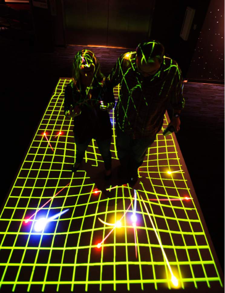Steve Griffin | The Salt Lake Tribune


A new exhibit that uses projected light to help understand gravity is one of the Clark Planetarium's revamped exhibits. The Salt Lake City Planetarium is planning a ìReady, Set, Relaunchî party on Saturday.