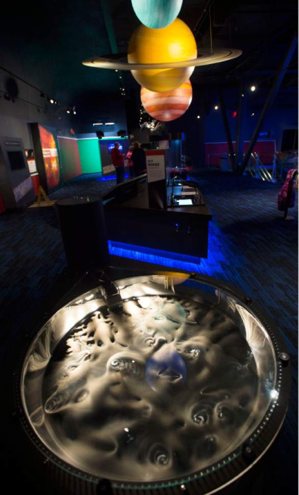 Steve Griffin | The Salt Lake Tribune


A new exhibit that uses water and dry ice to simulate comets is one of the Clark Planetarium's revamped exhibits unveiled Monday, Oct. 17, 2016, in Salt Lake City. The Planetarium is planning a "Ready, Set, Relaunch" party on Saturday.