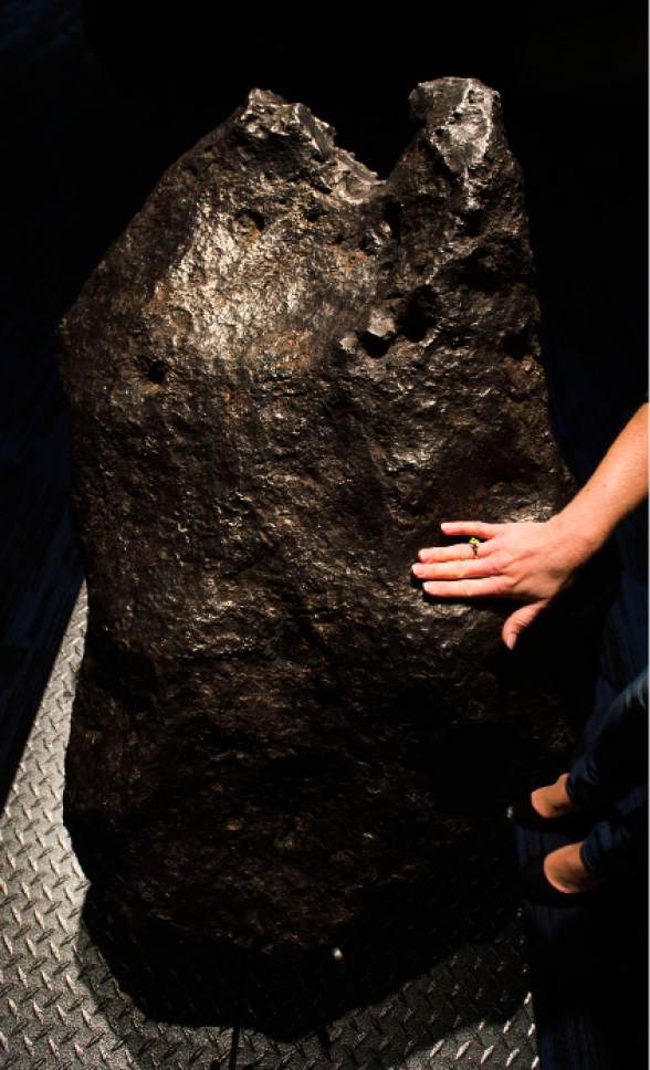 Steve Griffin | The Salt Lake Tribune


A large meteorite weighing almost a ton that was found in China hundreds of years after it hit the earth is one of the Clark Planetarium's revamped exhibits unveiled Monday, Oct. 17, 2016, in Salt Lake City. The Planetarium is planning a "Ready, Set, Relaunch" party on Saturday.