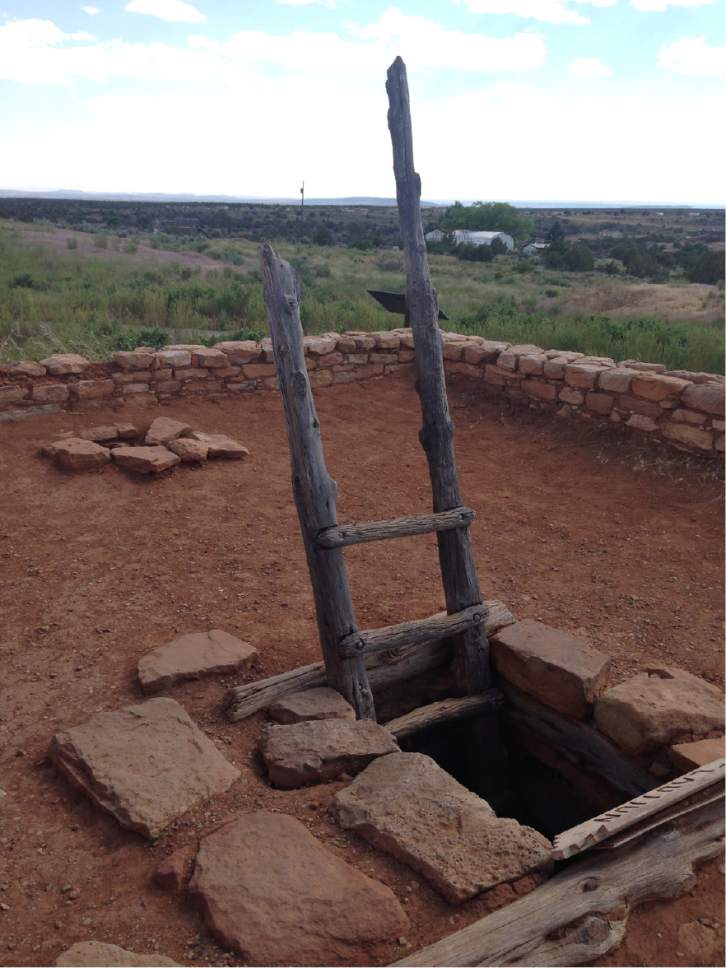 Erin Alberty  |  The Salt Lake Tribune

A ladder from the roof allows visitors to climb into a restored underground dwelling, called a kiva, at Edge of the Cedars State Park on June 11, 2016 in Blanding.