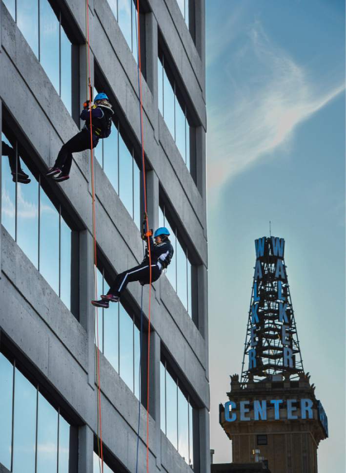 Francisco Kjolseth | The Salt Lake Tribune
On Friday, up to 90 rappellers will raise awareness about domestic violence
by going "Over The Edge" of the downtown Maverick Building. On Thursday, members of the media were given the chance to try it for themselves.
