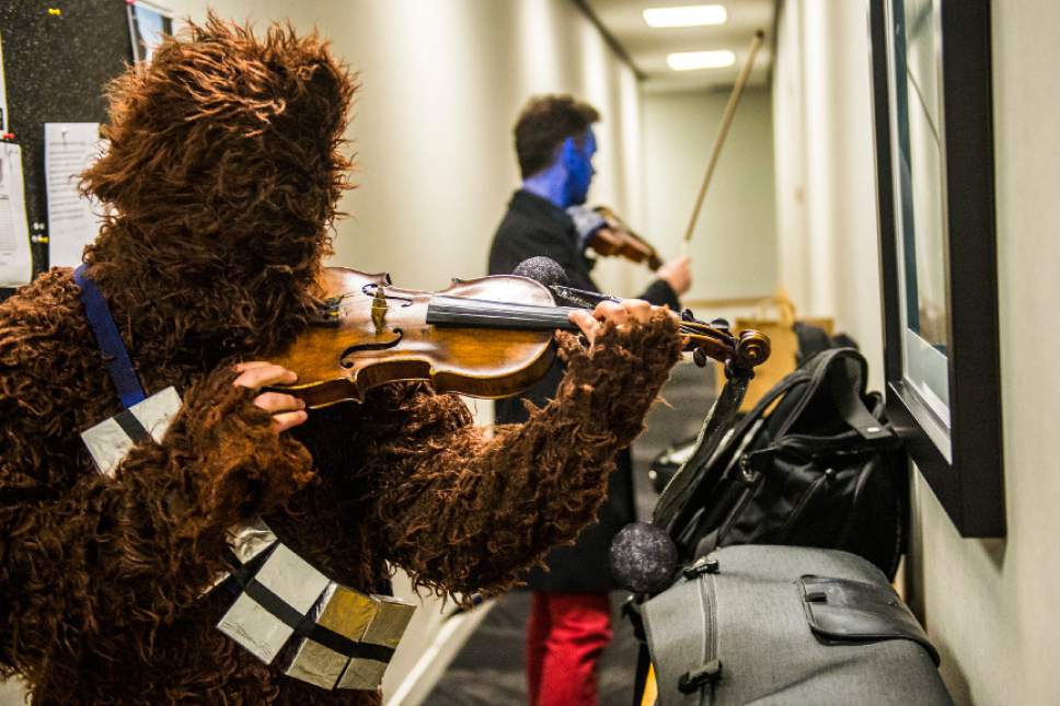 Chris Detrick  |  The Salt Lake Tribune
Violinist David Langer, as Chewbacca, and violist Joel Gibbs, as Nightcrawler, warm up before the Utah Symphony Halloween Concert at Abravanel Hall Tuesday October 27, 2015.