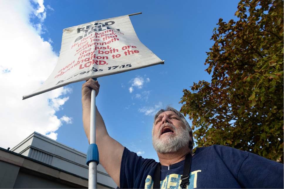 Scott Sommerdorf   |  The Salt Lake Tribune  
Lonnie Pursifull shouts out his message outside the LDS Conference Center as people make their way to attend Conference, October 1, 2016.