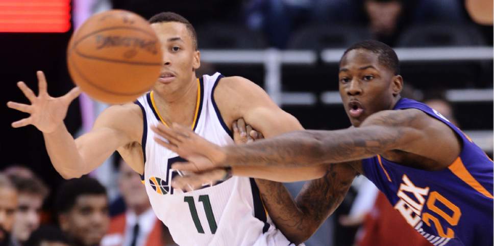 Steve Griffin / The Salt Lake Tribune


Utah Jazz guard Dante Exum (11) reaches for the ball as Phoenix Suns guard Archie Goodwin (20) defends the play during game at Vivint Smart Home Arena in Salt Lake City Wednesday October 12, 2016.