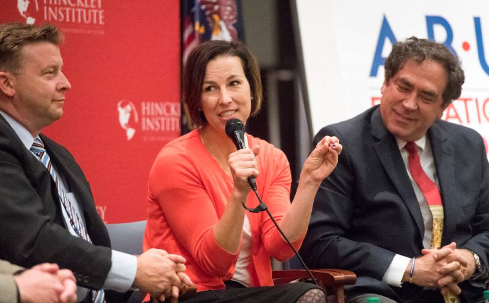 Rick Egan  |  The Salt Lake Tribune

Sen. Todd Weiler (left) listens as State House Democratic candidate Suzanne Harrison speaks during a panel discussion at the Hinckley Institute, during a discussion on how religion and politics mix, Monday, October 3, 2016.  Utah State Rep. Brian King is on the right.