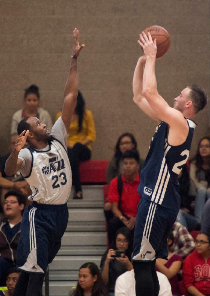 Rick Egan  |  The Salt Lake Tribune

Gordon Hayward, (20) shoots over Chris Johnson (23), as the Utah Jazz play a surprise scrimmage at Granger High School, Friday, September 30, 2016.