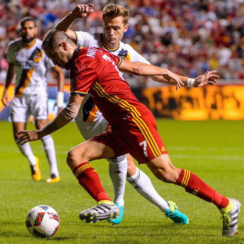Trent Nelson  |  The Salt Lake Tribune
Real Salt Lake forward Juan Martinez (7) defended by Los Angeles Galaxy forward Robbie Rogers (14) as Real Salt Lake hosts the Los Angeles Galaxy, MLS soccer at Rio Tinto Stadium in Sandy, Wednesday September 7, 2016.