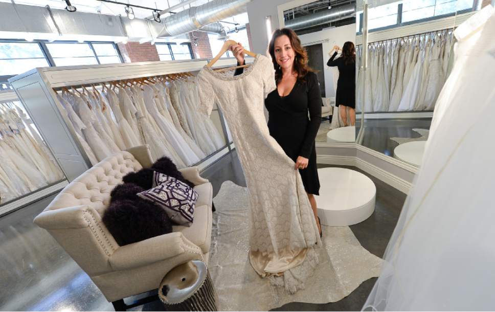 Francisco Kjolseth | The Salt Lake Tribune
Nicole Thomas, owner of Gateway Bridal & Prom gives a tour of her store, that she recently relocated to the North end of Pioneer Park after being across from the downtown homeless shelter since 2008. "I love this area and I want to be part of the solution," she said while discussing the criminal elements of the shelter that made it unbearable and worrisome for her staff at night. A nearby move seemed to be the best solution so she could maintain the store's name, gain square footage and support from adjacent businesses.