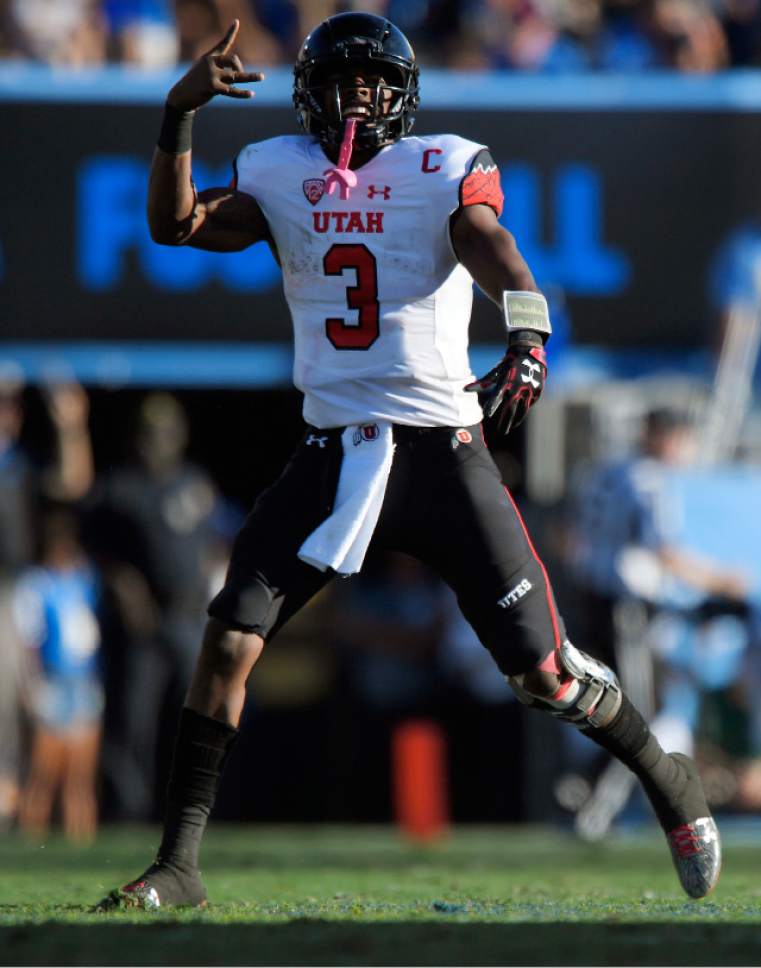 Utah quarterback Troy Williams celebrates after they scored a touchdown during the second half of an NCAA college football game against UCLA, Saturday, Oct. 22, 2016, in Pasadena, Calif. Utah won 52-45. (AP Photo/Mark J. Terrill)