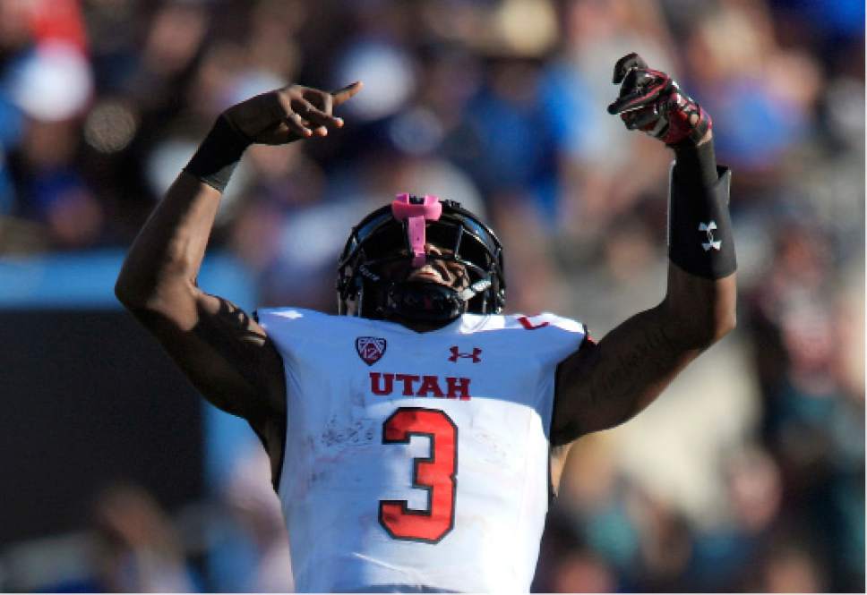 Utah quarterback Troy Williams celebrates after they scored a touchdown during the second half of an NCAA college football game against UCLA, Saturday, Oct. 22, 2016, in Pasadena, Calif. Utah won 52-45. (AP Photo/Mark J. Terrill)