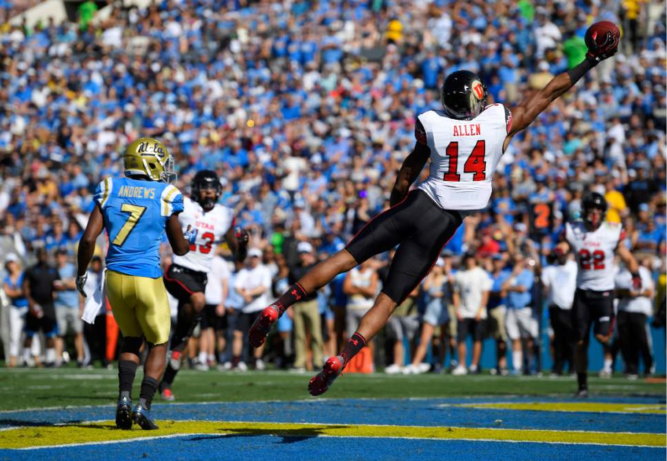 Utah defensive back Brian Allen, right, almost intercepts a pass in the end zone that was intended for UCLA wide receiver Darren Andrews during the first half of an NCAA college football game, Saturday, Oct. 22, 2016, in Pasadena, Calif. (AP Photo/Mark J. Terrill)