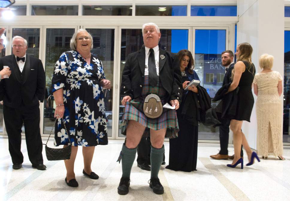 Leah Hogsten  |  The Salt Lake Tribune
Mike McLarty draws a laugh from his wife as he lifts his kilt in fun at Salt Lake City's George S. and Dolores Doré Eccles Theater's opening festivities, October 21, 2016.  The night  featured entertainment legend Rita Moreno, who emceed a lineup that including fellow Tony winner Brian Stokes Mitchell, Tony-nominated Megan Hilty and performers from many of Salt Lake City's top music, dance and theater organizations as pianist Kurt Bestor conducted the 60-piece Ballet West Orchestra. The theatre's grand opening  weekend features a day of free performances Saturday and a rare on-the-road broadcast of the Mormon Tabernacle Choir's "Music and the Spoken Word" on Sunday.