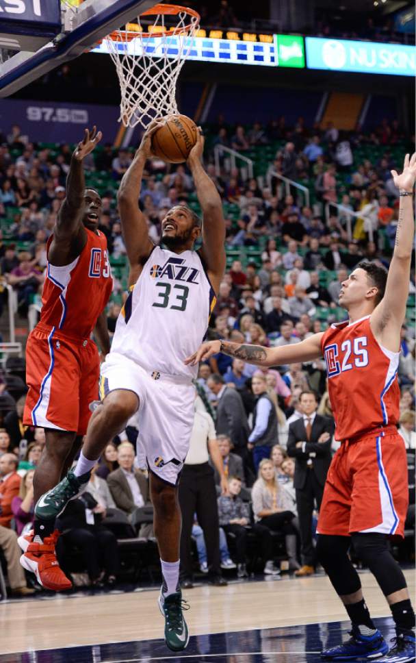 Francisco Kjolseth | The Salt Lake Tribune
Utah Jazz center Boris Diaw (33) pushes past the LA Clippers in game action at the Vivint Smart Home Arena on Monday, Oct. 17, 2016.