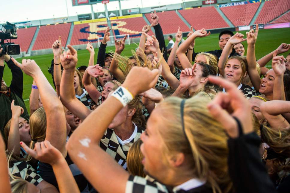 Chris Detrick  |  The Salt Lake Tribune
Members of the Davis soccer team celebrate after defeating Fremont 2-1 in the 5A girls' state soccer championship at Rio Tinto Stadium Friday October 21, 2016.