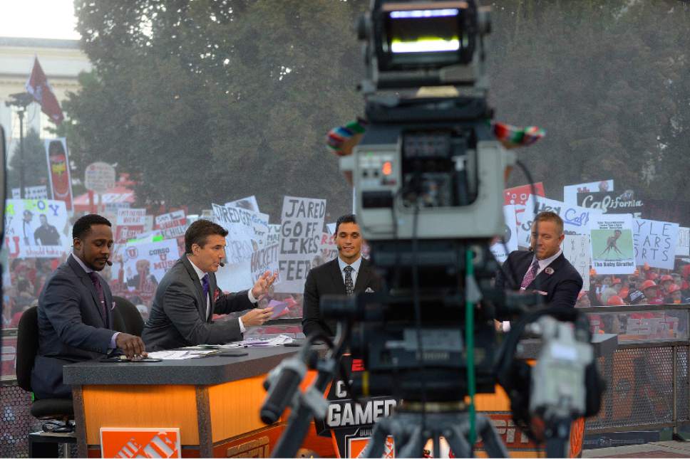 Leah Hogsten  |  The Salt Lake Tribune
l-r ESPN's "College GameDay," cast discuss the day's games. Hundreds of fans cheered for their teams Saturday, October 10, 2015, at The University of Utah's President's Circle, during the filming of ESPN's "College GameDay," a sports television show that previews and predicts winners of the nation's college football games and picked No. 5 Utah to beat No. 23 Cal.