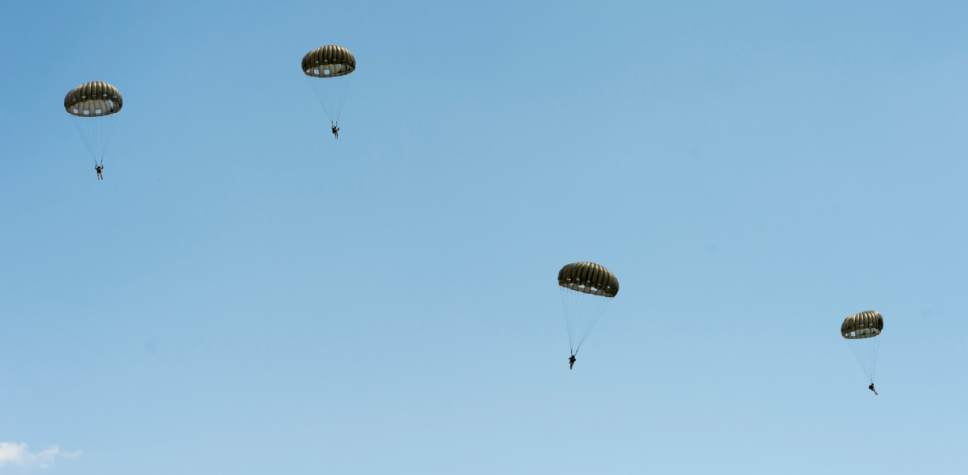Rick Egan  |  The Salt Lake Tribune

National Guardmembers from 1st Battalion, 19th Special Forces jump from a UH-60 Blackhawk helicopter as Utah Guard Special Forces Conduct Airborne Training in Ephraim, Thursday, August 14, 2014