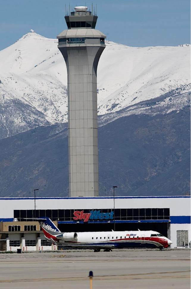 |  Tribune file photo

A Sky West plane lands at the Salt Lake International Airport in Salt Lake City, Utah, on Friday, April 1, 2011.