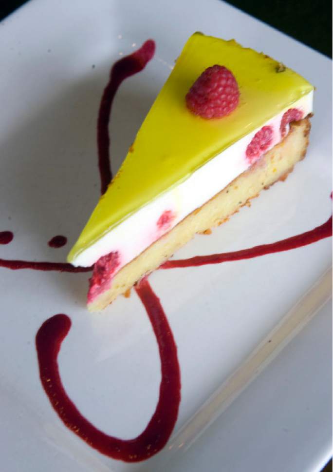 Al Hartmann  |  The Salt Lake Tribune

Fratelli Ristorante's "The Cake": Pistachio cake layered with lemon mouse and fresh raspberries, topped with a thin layer of butter cream, marzipan and a lemon glaze.