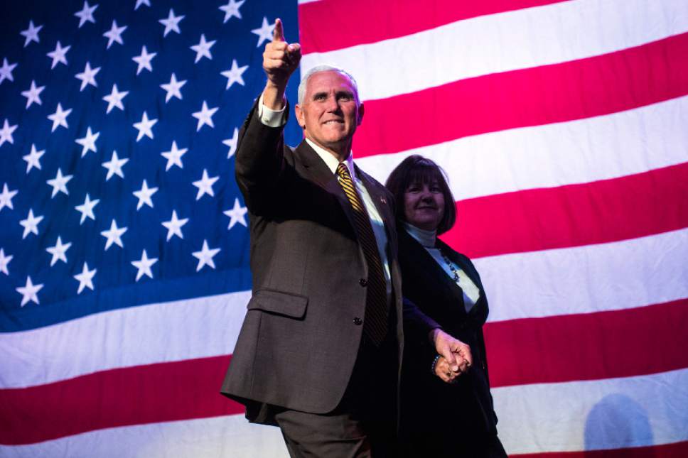 Chris Detrick  |  The Salt Lake Tribune
Republican vice presidential nominee Mike Pence and his wife Karen Pence are introduced during a rally at the Infinity Event Center Wednesday October 26, 2016.