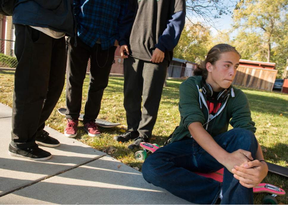 Leah Hogsten  |  The Salt Lake Tribune
Kalani Matthews, 17, and friends watch the police scene from across the street from Union Middle School after a 16-year-old boy was critically injured in a shooting outside the Sandy school. The shooting occurred about 3 p.m. when two teenage boys got into an argument on a field north of the school, said Sandy police Sgt. Dean Carriger. The victim -- who is a student at Hillcrest High School -- was transported by ambulance in critical condition to Intermountain Medical Center, where he went into surgery about 4:30 p.m. to treat two gunshot wounds. The 14-year-old suspect is in custody.