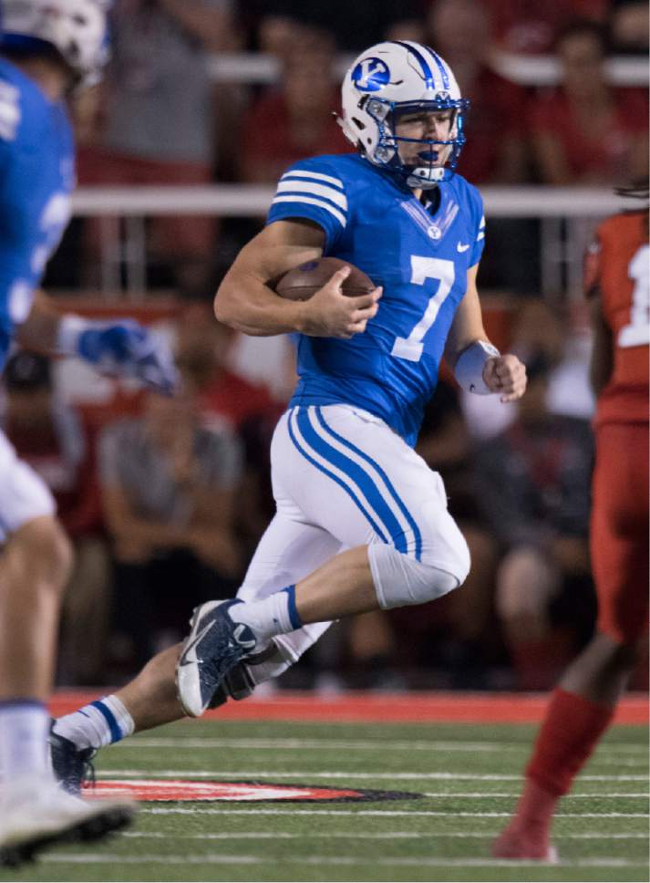 Rick Egan  |  The Salt Lake Tribune

Brigham Young Cougars quarterback Taysom Hill (7) runs the ball for the Cougars, in football action, at Rice-Eccles Stadium, Saturday, September 10, 2016.