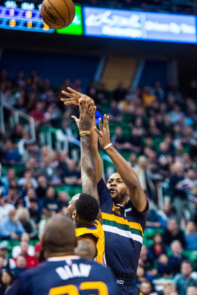 Chris Detrick  |  The Salt Lake Tribune
Utah Jazz forward Derrick Favors (15) shoots over Los Angeles Lakers center Tarik Black (28) during the game at Vivint Smart Home Arena Friday October 28, 2016.