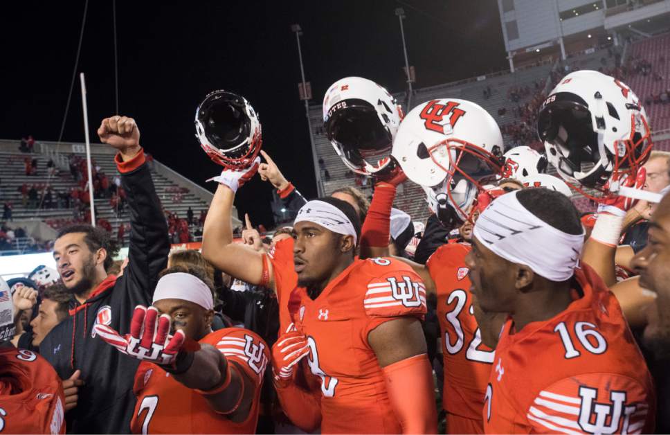 Rick Egan  |  The Salt Lake Tribune

Utah Utes sing "Utah Man" after their  36-23 win over Arizona, in PAC-12 football action, at Rice-Eccles Stadium, Saturday, October 8, 2016.