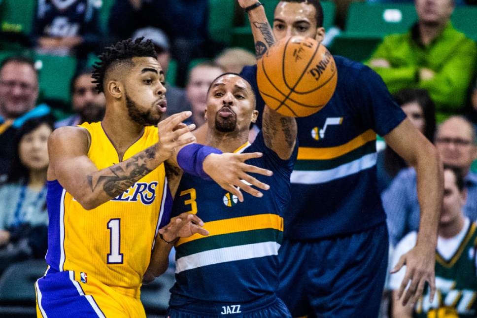 Chris Detrick  |  The Salt Lake Tribune
Los Angeles Lakers guard D'Angelo Russell (1) passes around Utah Jazz guard George Hill (3) during the game at Vivint Smart Home Arena Friday October 28, 2016.