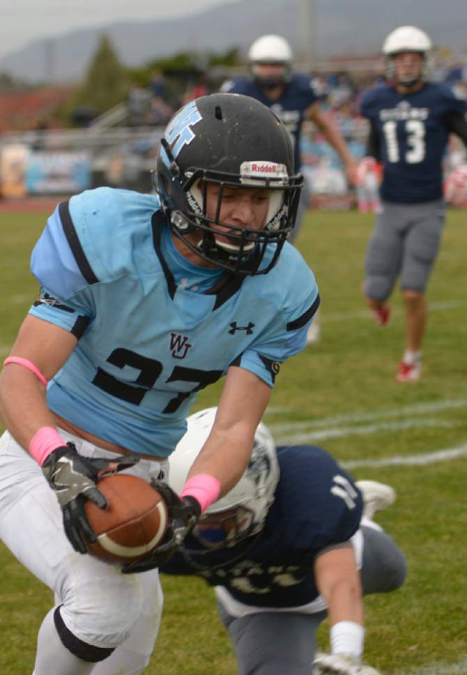 Leah Hogsten  |  The Salt Lake Tribune
West Jordan's Forest Rich with the dive into the end zone for a touchdown. Syracuse High School battles West Jordan High School in the opening round of the Class 5A football playoffs, Friday, October 28, 2016.