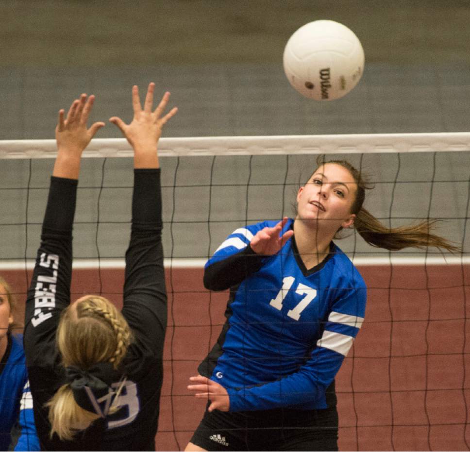 Rick Egan  |  The Salt Lake Tribune

Panguitch Bobcats McCall Tebbs (17) hits the ball past Rich Rebels Andee Cornia (33) in State 1A volleyball action Panguitch Bobcats vs. the Rich Rebels, Saturday, October 29, 2016.