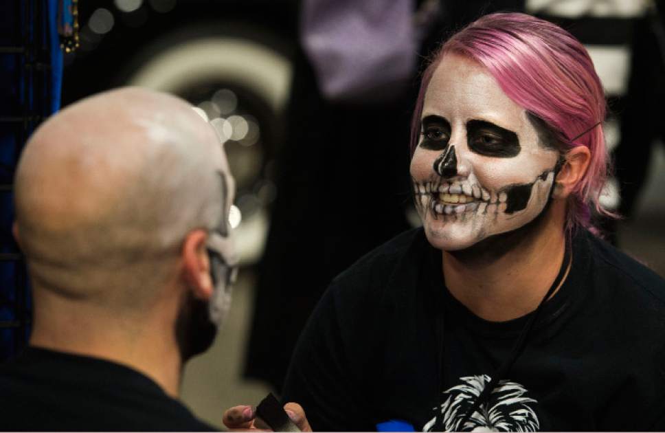 Steve Griffin / The Salt Lake Tribune

Amy Bennion, of Bumble-Puppy, puts the finishing touches on Chris Holmes' makeup as Halloween starts early as FearCon, a two-day fan convention for horror fantasy and Halloween-related stuff opens at the Salt Palace Convention Center in Salt Lake City October 26, 2016.