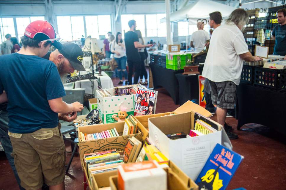 Chris Detrick  |  The Salt Lake Tribune
People browse merchandise for sale at The Salt Lake City Flea Market & Swap Meet at the Utah State Fair Park Saturday October 29, 2016. The Salt Lake Flea Market & Swap Meet will be held from 10am-4pm on the last Saturday of each month starting October 29th. The months of November and December will accommodate the holidays by hosting the events the Saturday prior to each holiday.