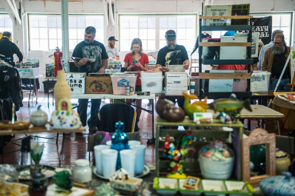 Chris Detrick  |  The Salt Lake Tribune
People browse merchandise for sale at The Salt Lake City Flea Market & Swap Meet at the Utah State Fair Park Saturday October 29, 2016. The Salt Lake Flea Market & Swap Meet will be held from 10am-4pm on the last Saturday of each month starting October 29th. The months of November and December will accommodate the holidays by hosting the events the Saturday prior to each holiday.