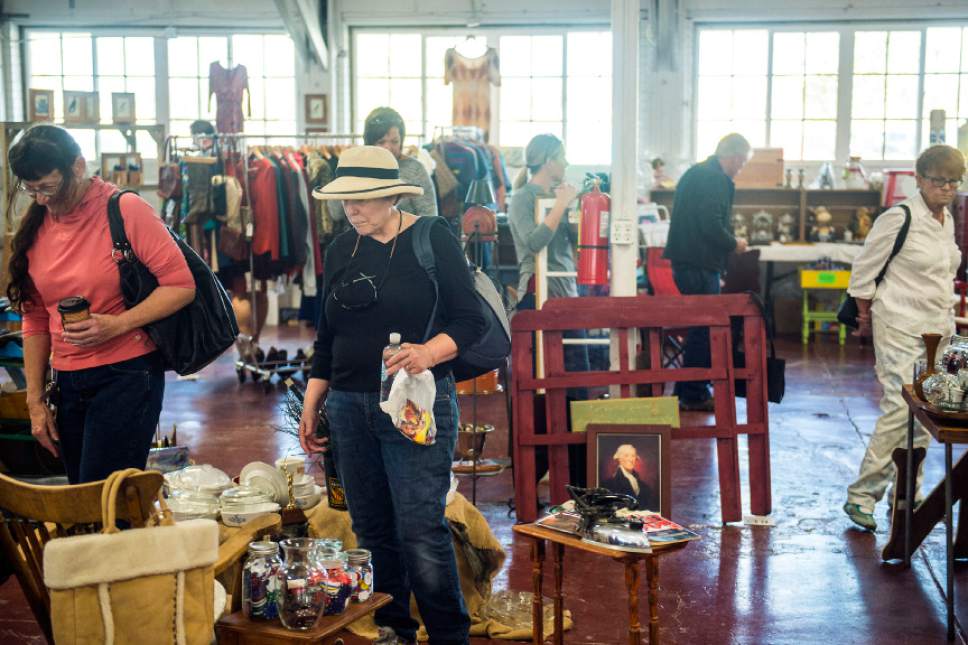 Chris Detrick  |  The Salt Lake Tribune
People browse merchandise for sale at The Salt Lake City Flea Market & Swap Meet at the Utah State Fair Park Saturday October 29, 2016. The Salt Lake Flea Market & Swap Meet will be held from 10am-4pm on the last Saturday of each month starting October 29th. The months of November and December will accommodate the holidays by hosting the events the Saturday prior to each holiday.