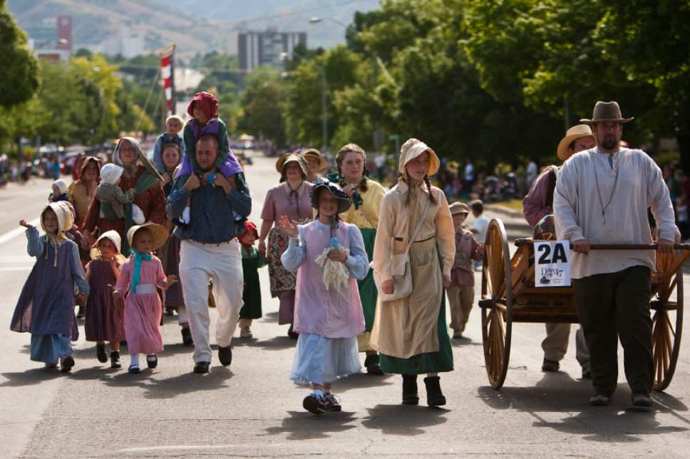 Chris Detrick  | The Salt Lake Tribune
Participants dressed as Mormon Pioneers walk along 500 South during the Days of '47 Youth Parade Saturday, July 17, 2010.