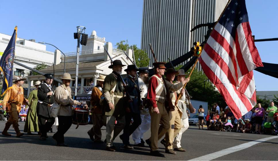 Al Hartmann  |  The Salt Lake Tribune 
Mormon Battalion reenactors are the first off the starting line to start the Tthe Day's of 47 parade in downtown Salt Lake City Monday July 25 celebrating Utah's heritage and spirit.