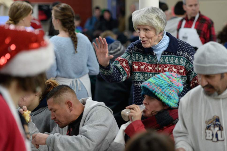 Francisco Kjolseth | The Salt Lake Tribune
Aadvocate Pamela Atkinson welcomes people as she and other community leaders served a Christmas dinner to more than 800 homeless Utahns in 2015 at St. Vincent de Paul Dining Hall in downtown Salt Lake City.
