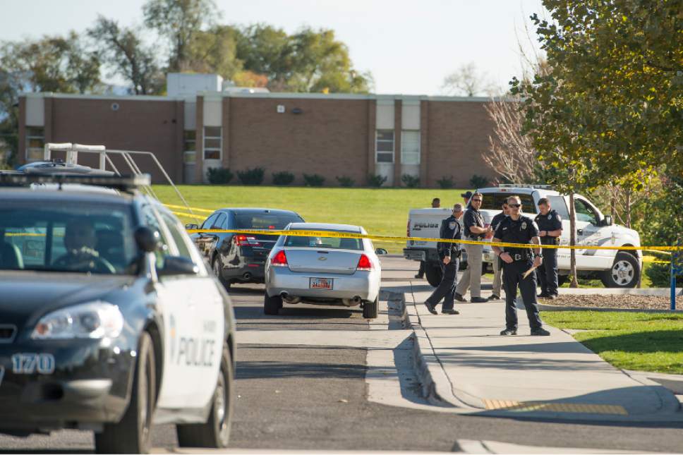 Leah Hogsten  |  The Salt Lake Tribune
Police investigate a shooting last week in which a 16-year-old boy was critically injured at Union Middle School in Sandy. A 14-year-old who is a student at the middle school shot the older boy after the two got into an argument on a field north of the school, said Sandy police Sgt. Dean Carriger.