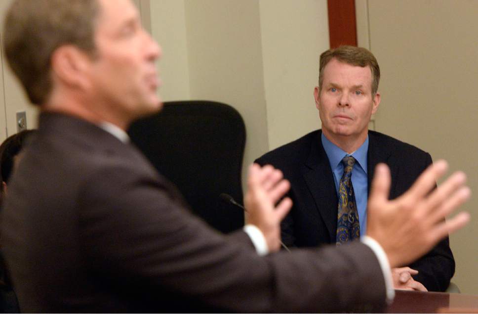 Al Hartmann  |  The Salt Lake Tribune 
Attorney Scott Williams, left, argues that charges against his client, John Swallow, right, should be dismissed during a hearing on Wednesday, July 13, 2016.