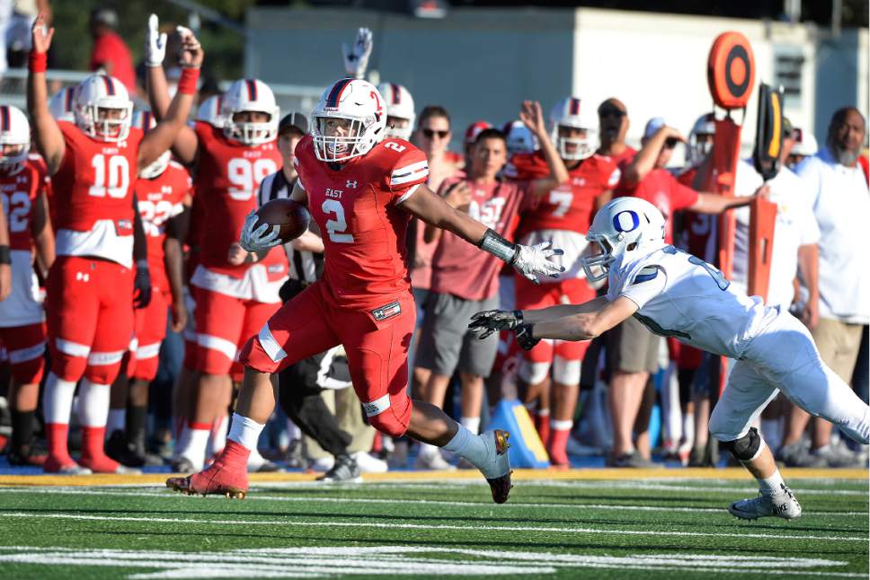 Scott Sommerdorf   |  The Salt Lake Tribune  
East RB Jaylen Warren breaks free for a 42 yard TD scamper during first half play. East High defeated Orem, 38-0 in Orem, Saturday, August 27, 2016.