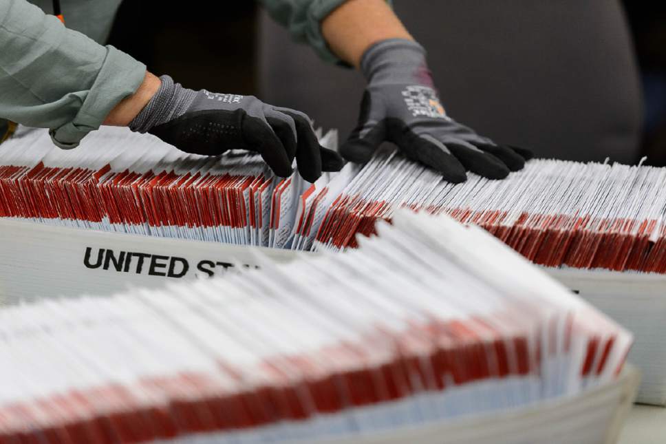 Trent Nelson  |  The Salt Lake Tribune
Employees in Salt Lake County's Election Division prepare mail in ballots to be sorted and counted at the Salt Lake County Government Center in Salt Lake City, Tuesday October 18, 2016.