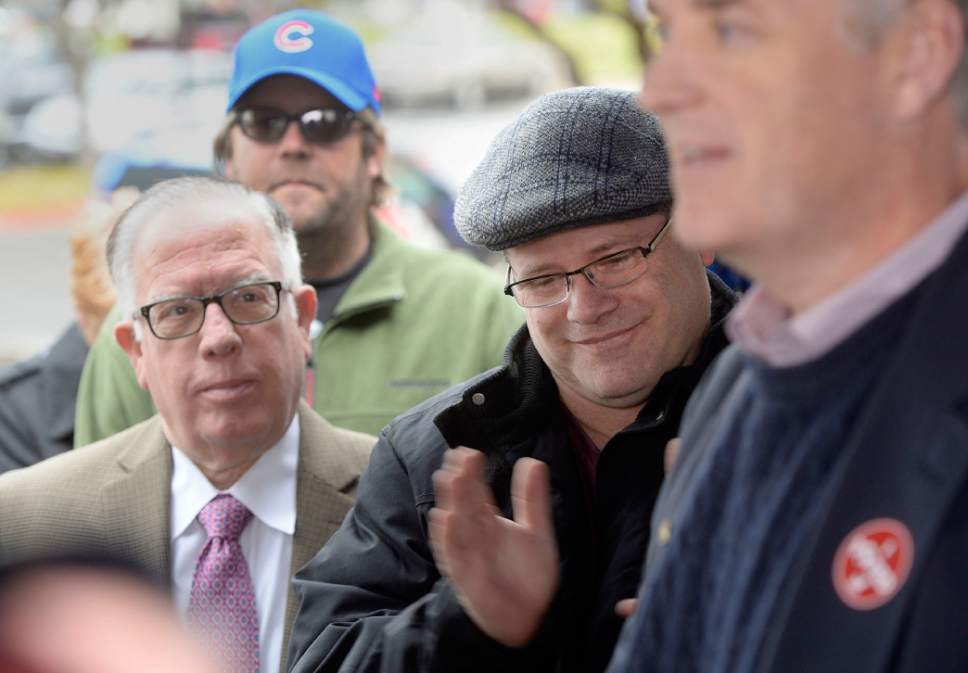 Al Hartmann  |  The Salt Lake Tribune
Actor Sean Astin joins Utah State Democratic chairman Peter Corroon outside the Salt Lake County building Monday November 1 to encourage people to vote early and consistently for every election.  County Councilman Sam Granato, left.