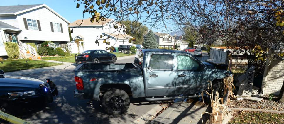 Steve Griffin / The Salt Lake Tribune


A bank robbery suspect was critically injured in a shoot-out with police in West Jordan, after crashing this truck into a cinderblock wall, following a chase after a robbery at a local credit union police reported in West Jordan, Utah Wednesday November, 02, 2016.