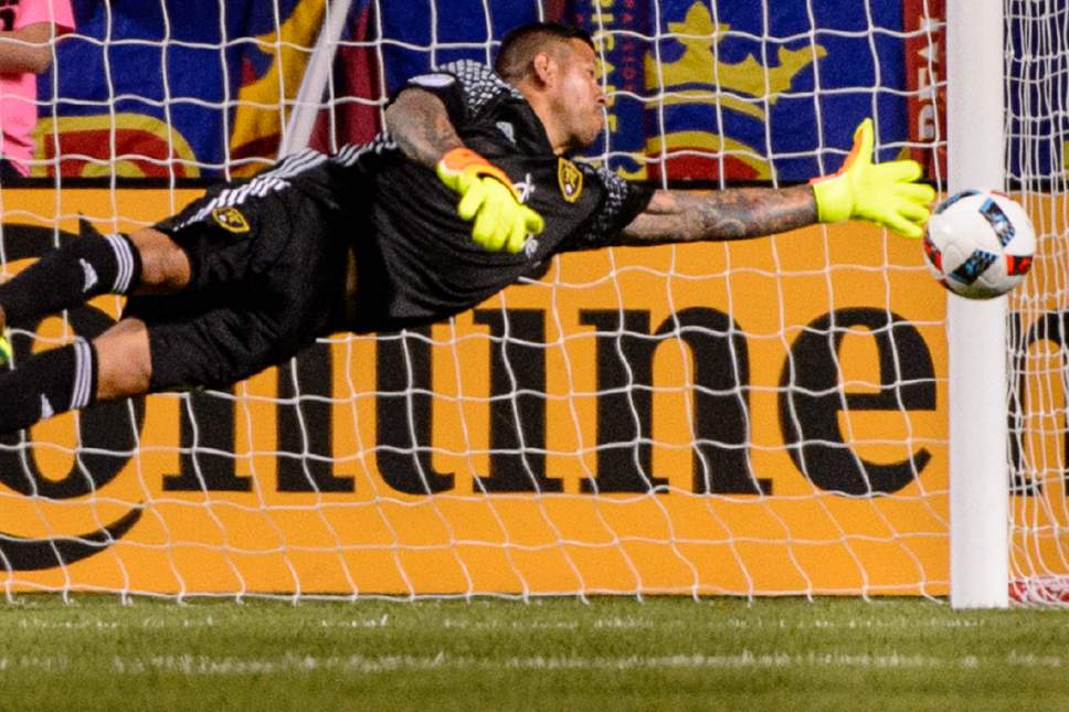 Trent Nelson  |  The Salt Lake Tribune
Real Salt Lake goalkeeper Nick Rimando (18) makes a diving save as Real Salt Lake faces FC Dallas at Rio Tinto Stadium in Sandy, Saturday August 20, 2016.