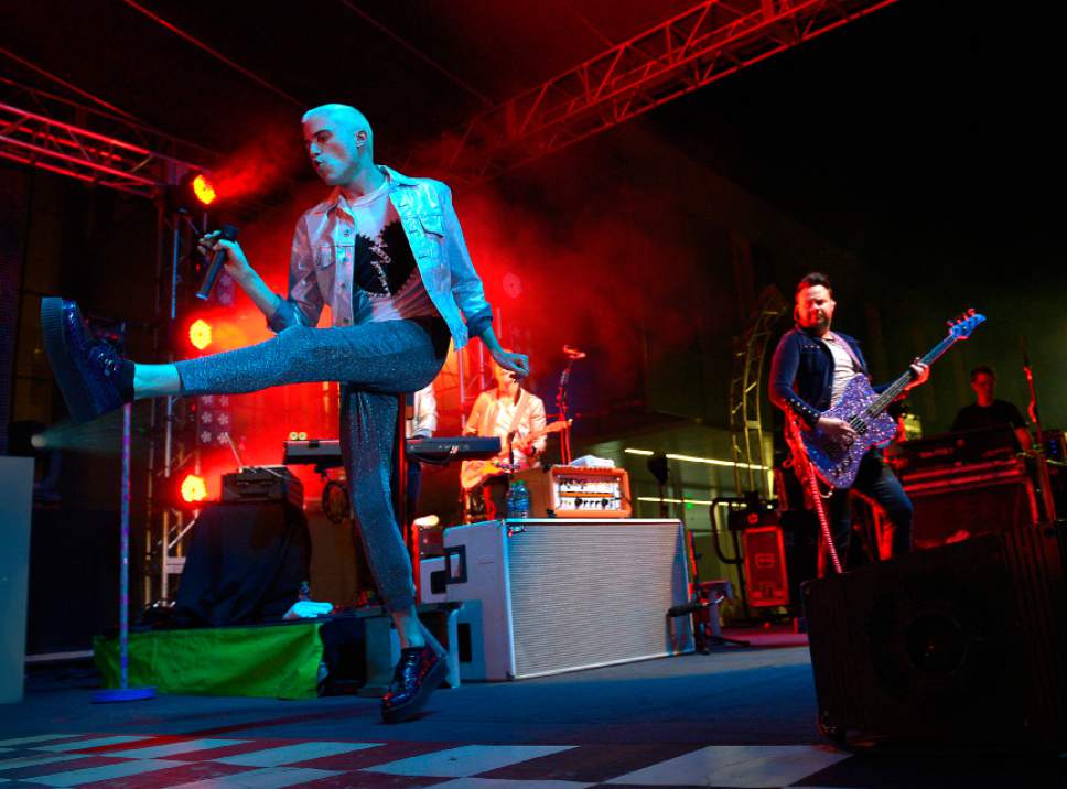 Leah Hogsten  |  The Salt Lake Tribune
Neon Trees, Provo's best known band, play a free show Friday, October 3, 2014 to a packed crowd in downtown Provo as part of the 5th Annual Rooftop Concert Series. Neon Trees are; drummer Elaine Bradley, guitarist Chris Allen, bassist Branden Campbell and lead singer Tyler Glenn.