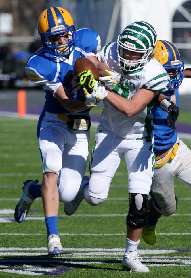 Steve Griffin / The Salt Lake Tribune


San Juan defender Jordan Blake rips the ball away from South Summit receiver Parker Grajek for the interception during class 2A semifinal football game at Stewart Stadium on the Weber State University campus in Ogden Thursday November 3, 2016.